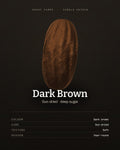 A single dark brown sun-dried date, soft and deeply coloured